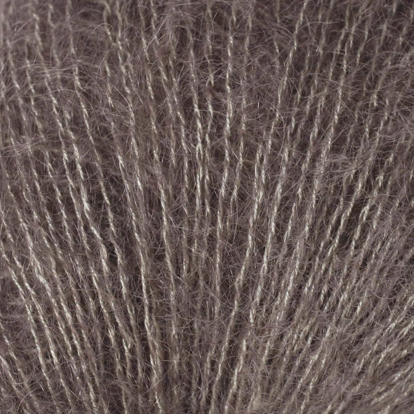 Soft and fluffy Berroco yarn in a light taupe color, ideal for cozy knitting projects