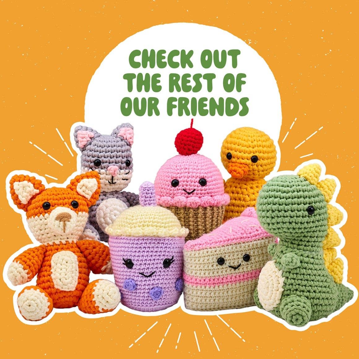 Plaid Crafts duck crochet kit for beginners showing colorful amigurumi friends including duck fox cupcake and dinosaur