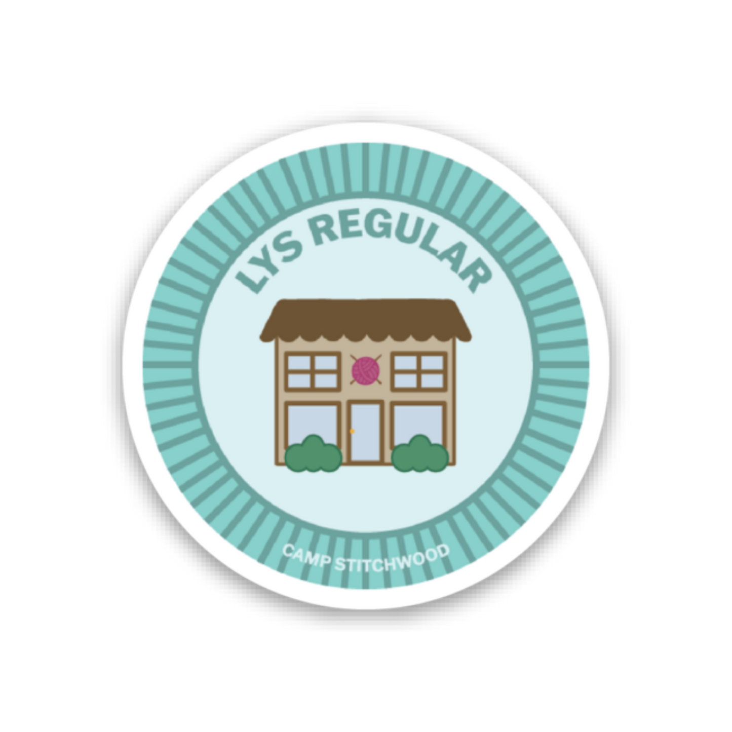 Camp Stitchwood name badge sticker featuring a playful illustration of a building with a decorative design