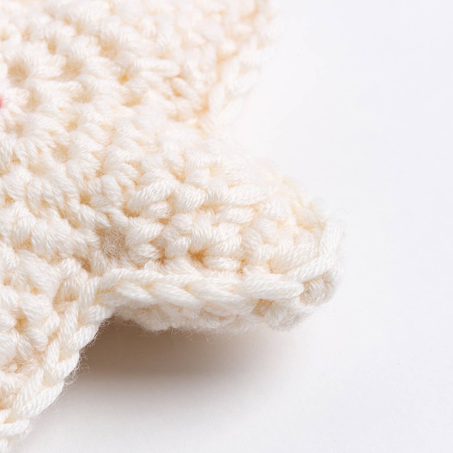 Close up cream yarn crochet detail for Belle the Reindeer crochet pattern by Wool Couture Company