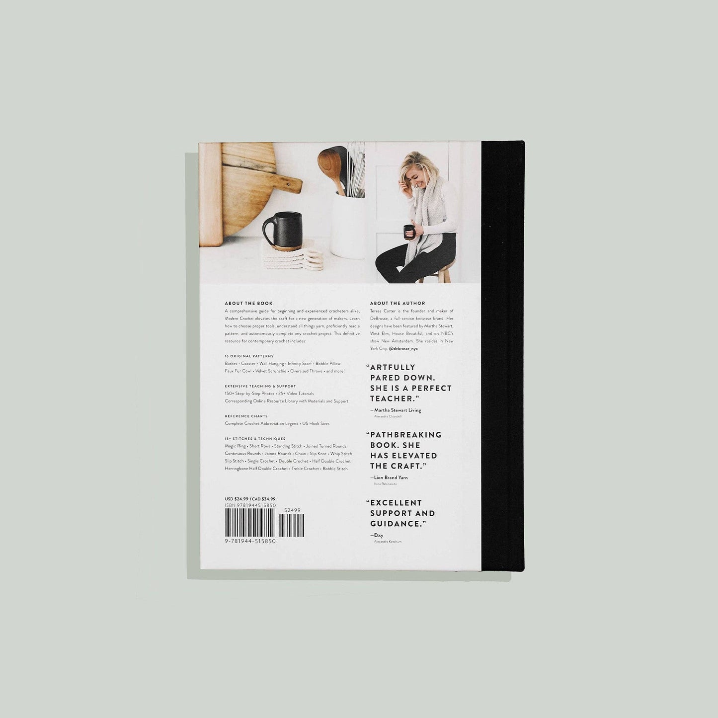 Modern Crochet Patterns Book by Paige Tate & Co with a sleek black spine and informative back cover