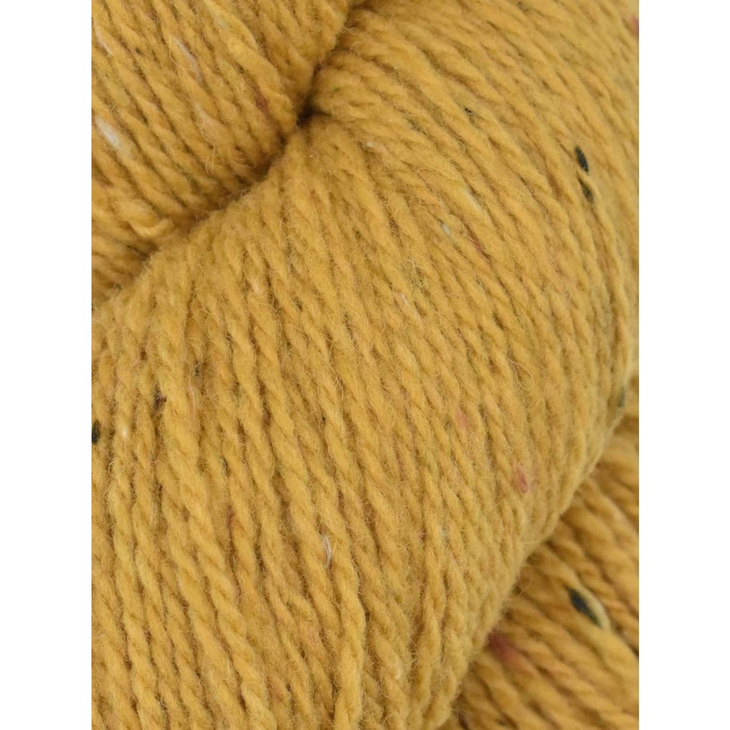 Close-up of Ella Rae Eco Tweed yarn in golden yellow with colorful flecks for knitting projects