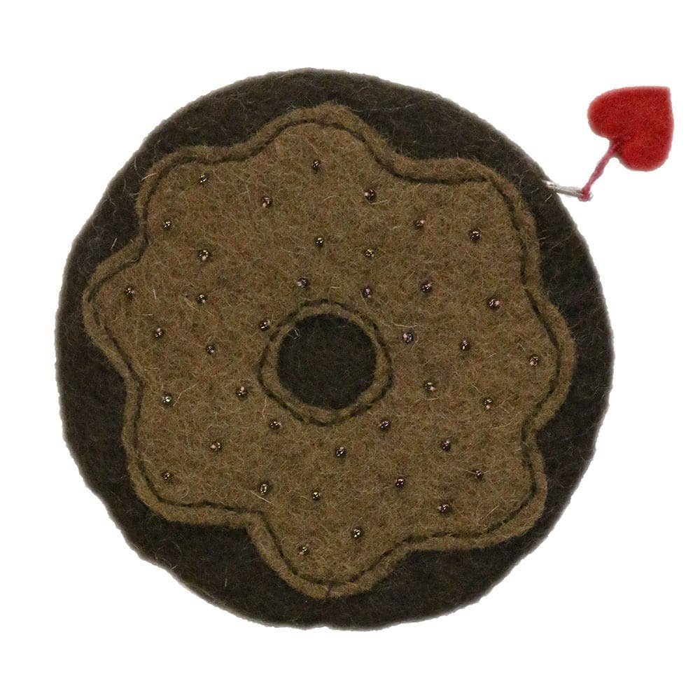 Unique felt bag designed as a donut with decorative beads and a heart tag