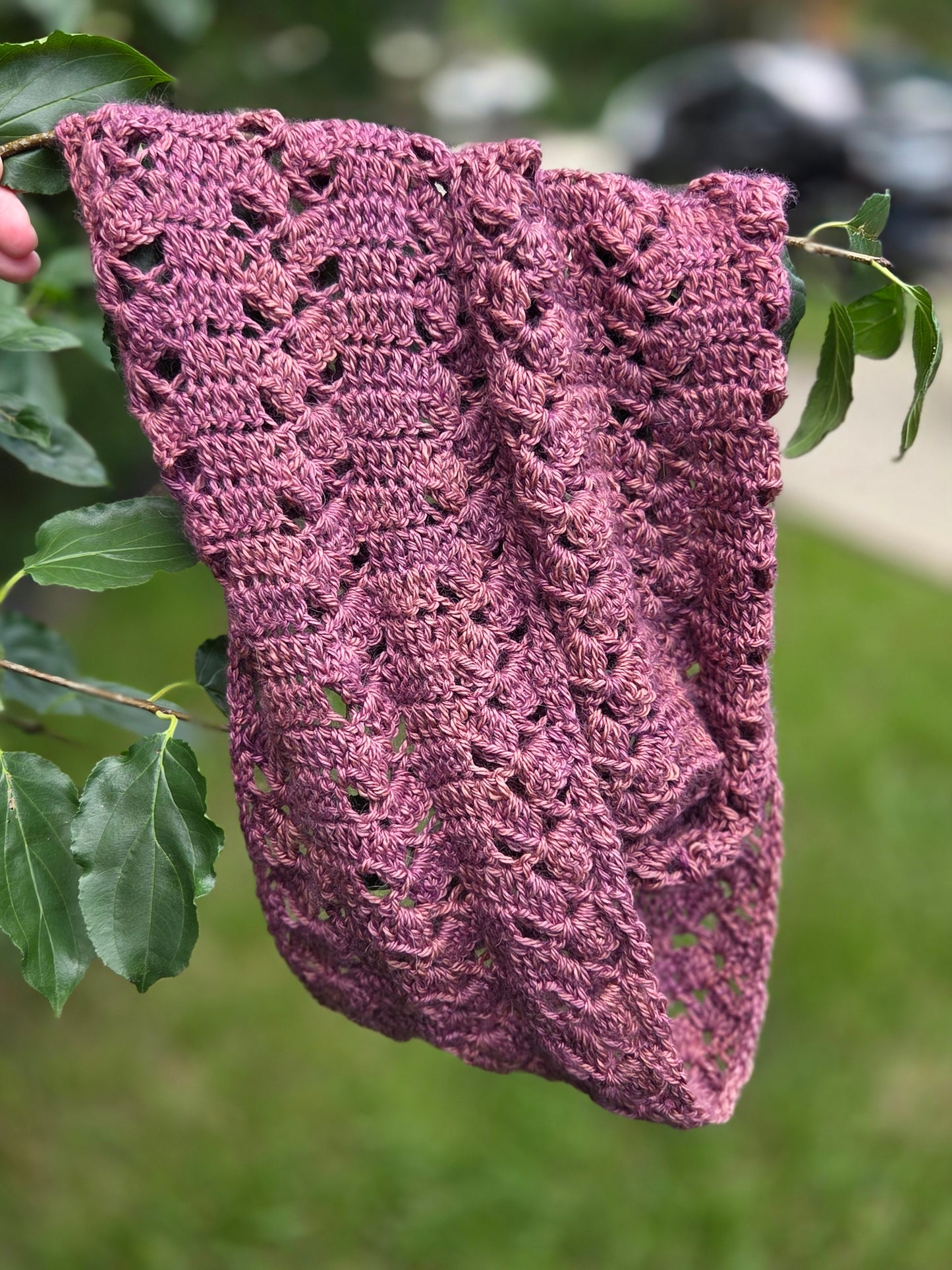 Pink hand crocheted lace infinity scarf with openwork stitch draped on branch lace infinity scarf workshop