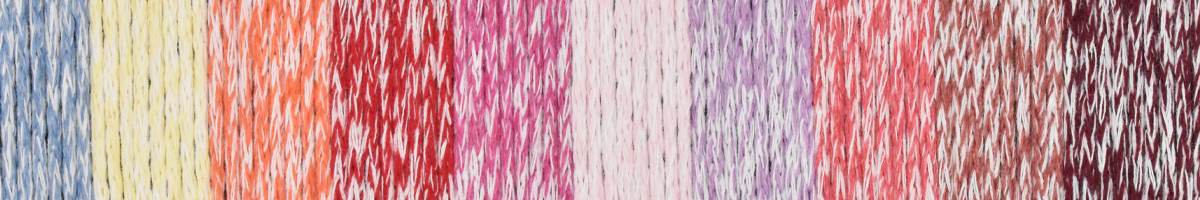 Colorful strands of KFI Collection Eco Bag yarn by Knitting Fever in various shades for crafting