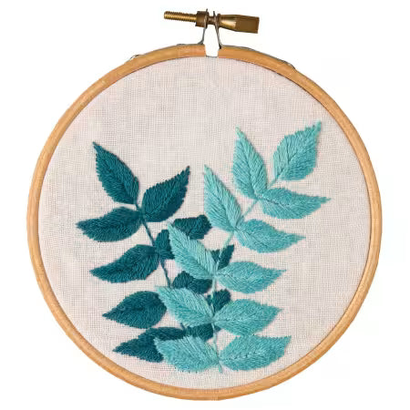 Leisure Arts embroidery kit teal featuring intricate leaf designs stitched in varying teal shades