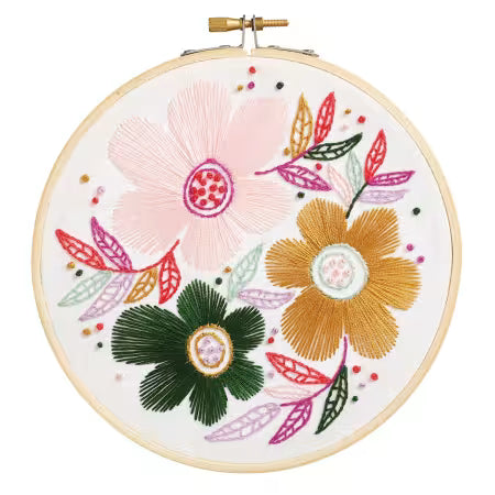 Leisure Arts Fancy Flowers embroidery kit featuring colorful floral designs in a hoop