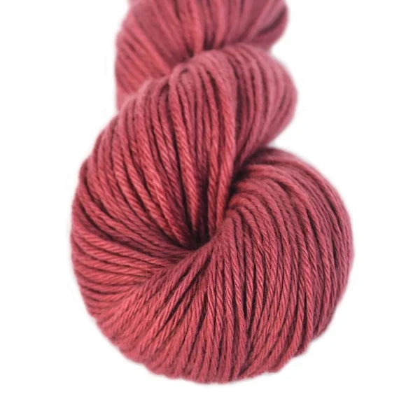 Lotus Yarns DK yarn in rich burgundy color, perfect for knitting and crochet projects