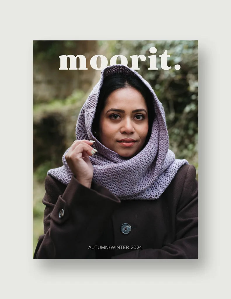 Moorit Magazine crochet patterns cover featuring woman wearing lavender crochet hooded scarf outdoors