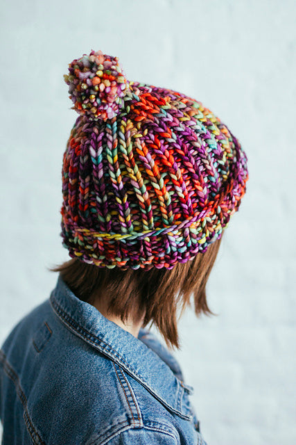 Colorful knitted Nina hat featured in a class at AriYARN Shop and Studio in Park Ridge