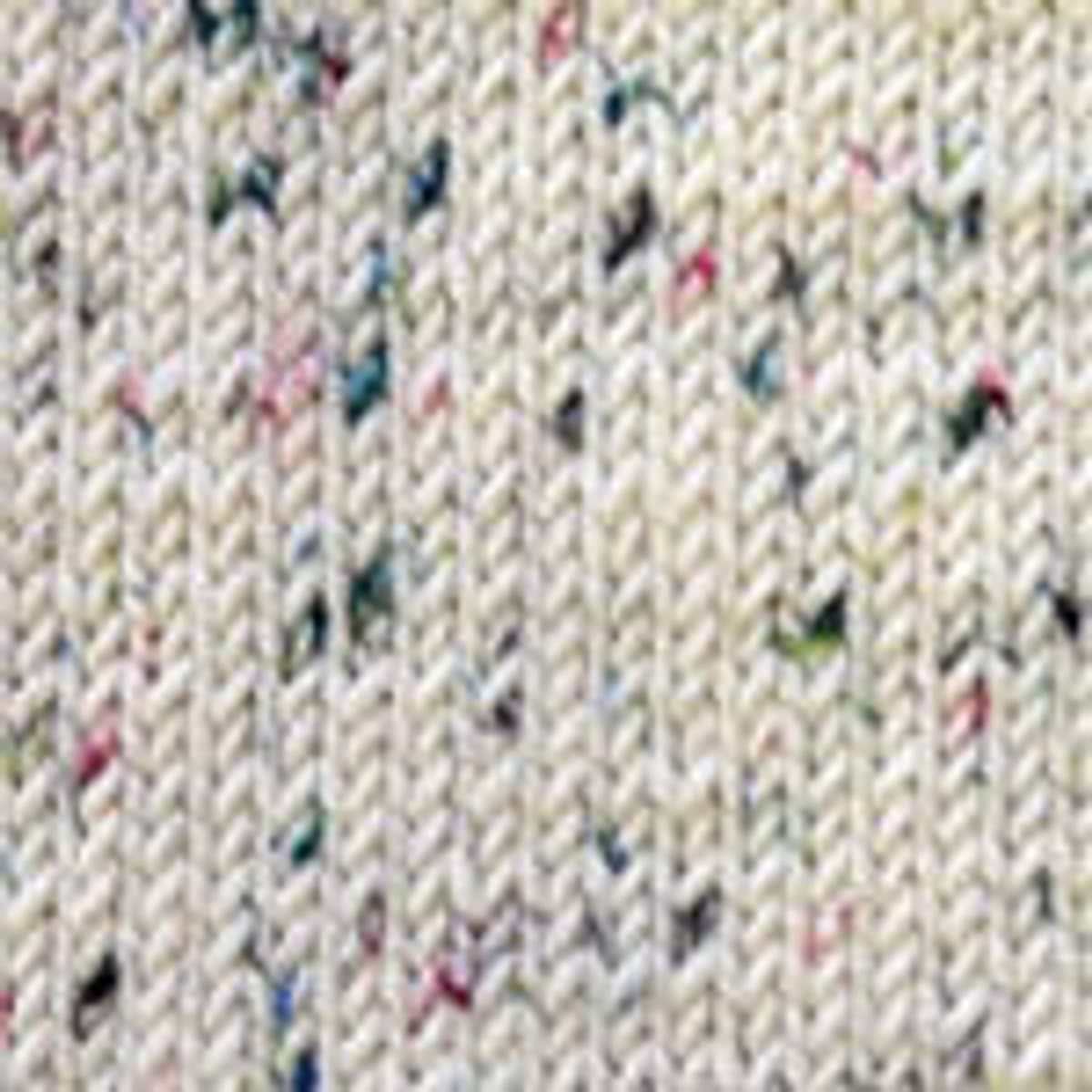 Plymouth Yarn Merino Wool Socks in a soft cream color with colorful specks for warmth and comfort