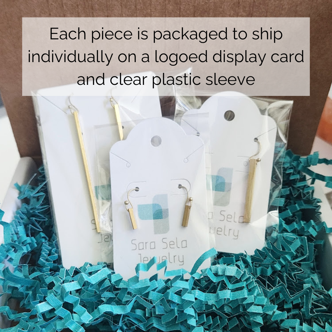 Sara Sela Jewelry beaded edgy fashion necklace on logoed display cards packaged in box with teal crinkle paper