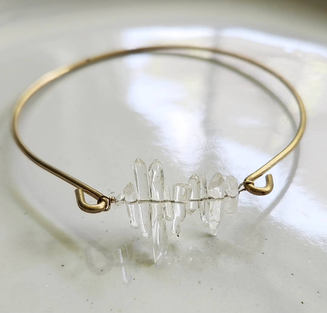 Sara Sela Jewelry clear quartz bangle bracelet with raw clear quartz cluster on thin gold wire band