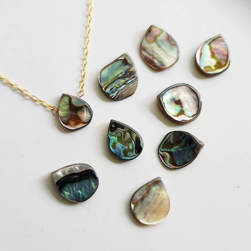 Sara Sela Jewelry rainbow abalone shell teardrop jewelry necklace and loose teardrop cabochons in gold bezels
