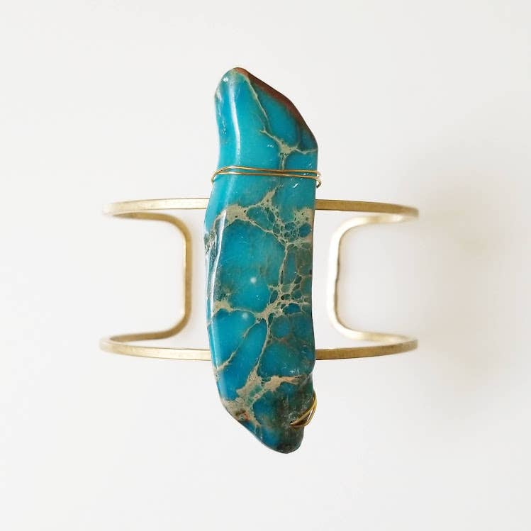 Sara Sela Jewelry sea blue magnesite cuff bracelet with elongated blue magnesite stone on gold open cuff