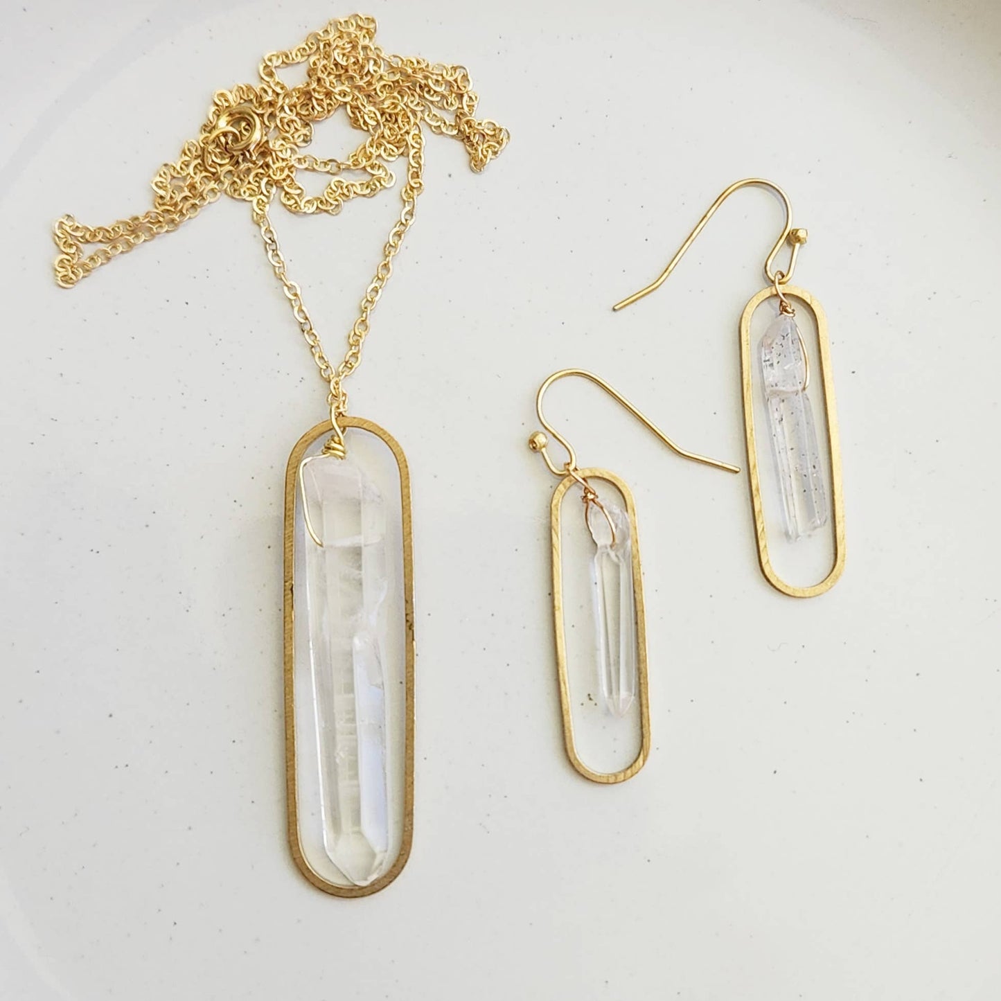 Gold framed necklace and wire wrapped quartz crystal earrings by Sara Sela Jewelry clear quartz drops