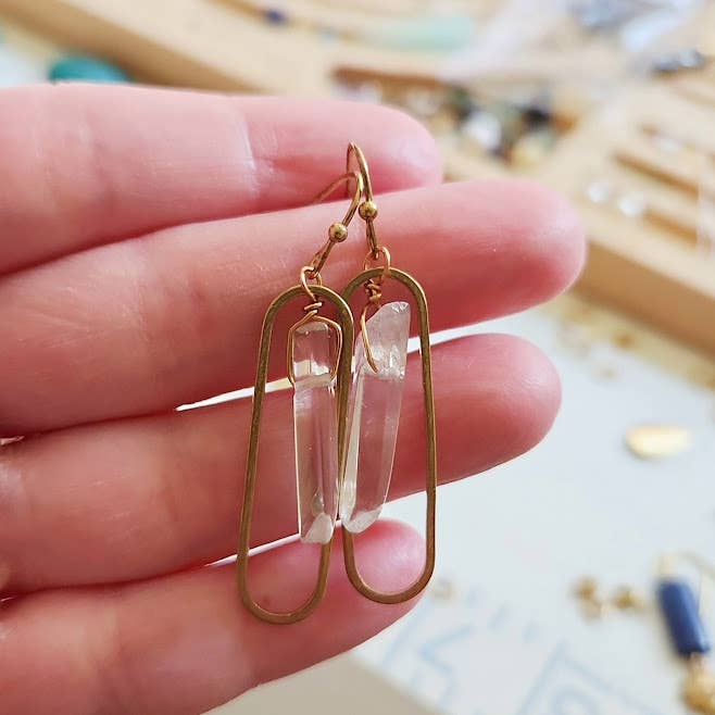 Sara Sela Jewelry wire wrapped quartz crystal earrings with raw clear quartz points and brass oval hoops
