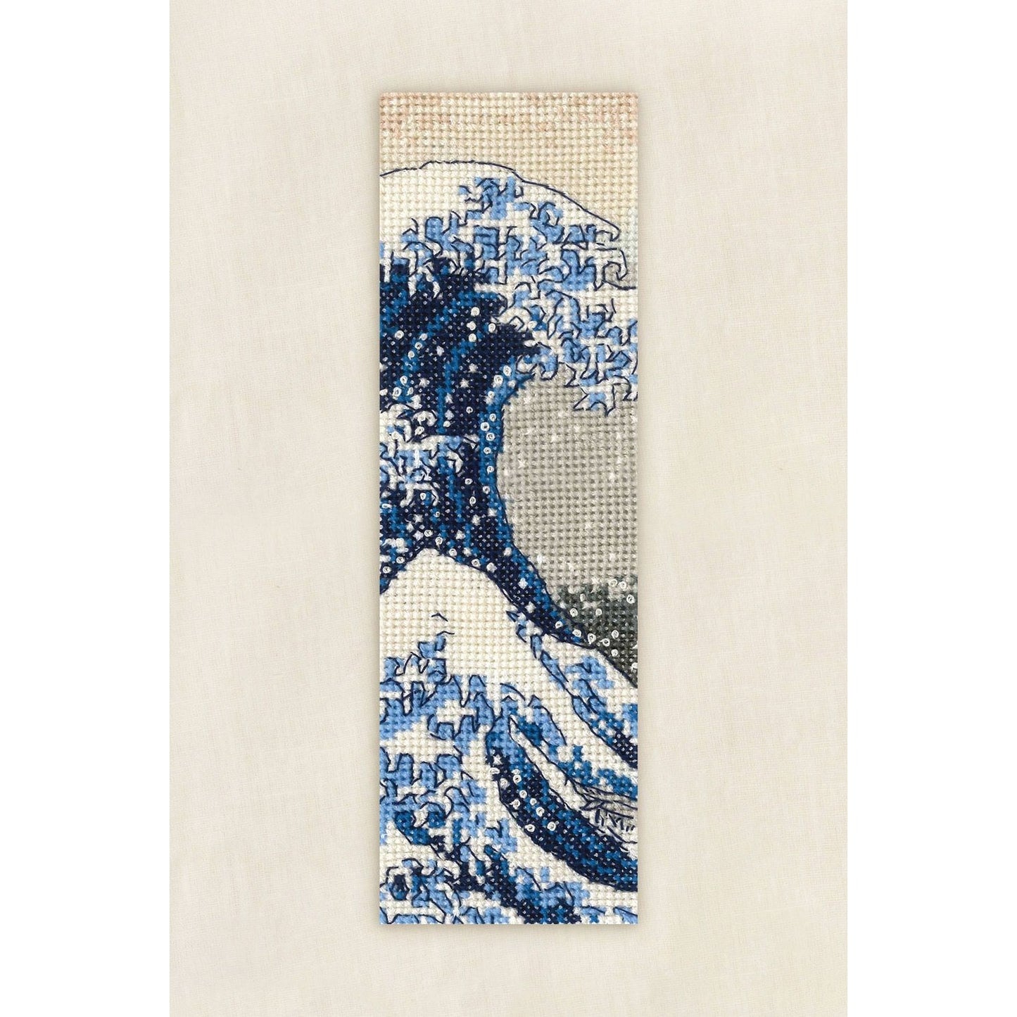 DMC cross stitch bookmark featuring a wave design with blue and white stitches cross stitch details
