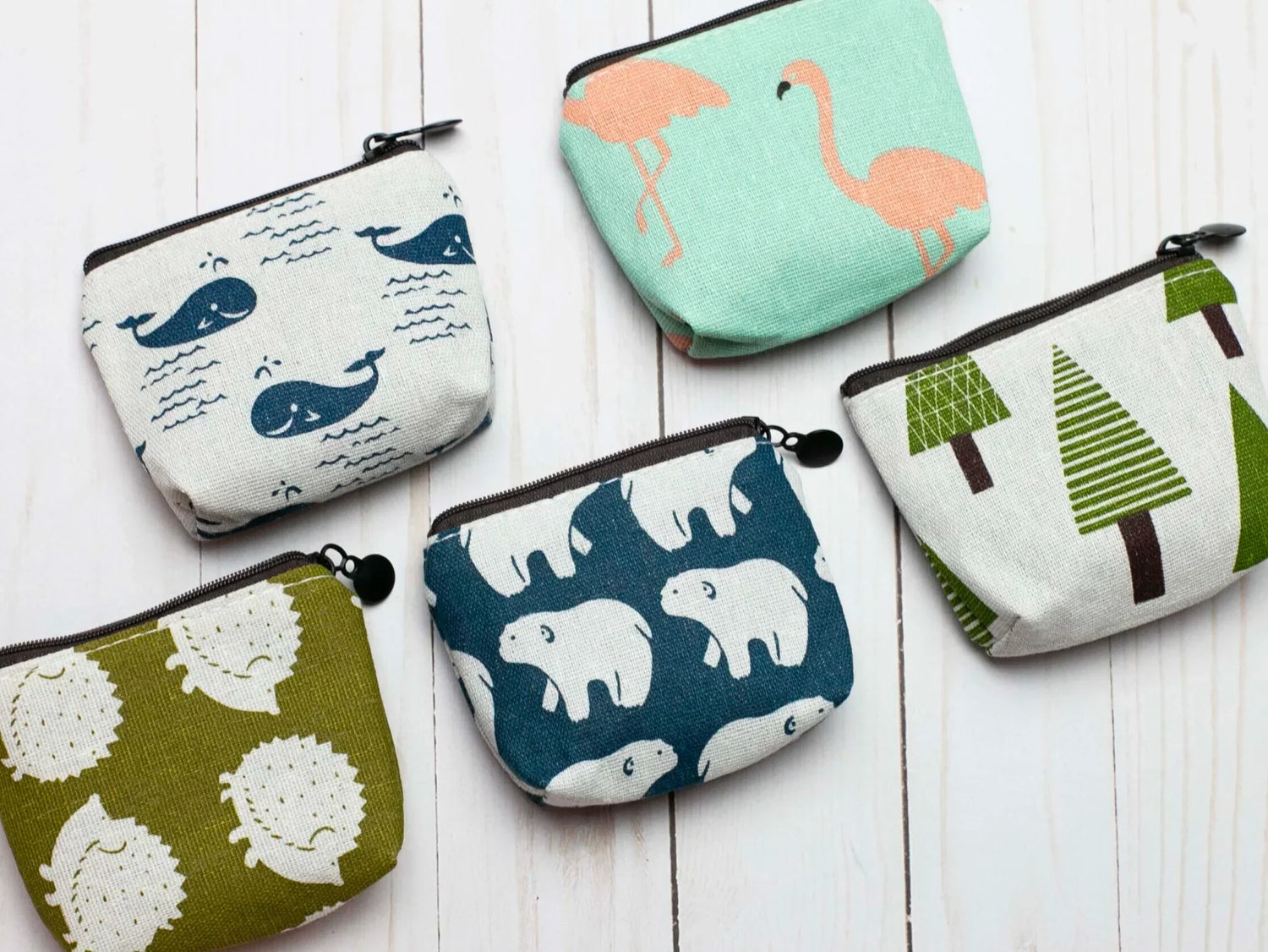 Assorted project bags for knitting and crochet, with yarn and tools inside