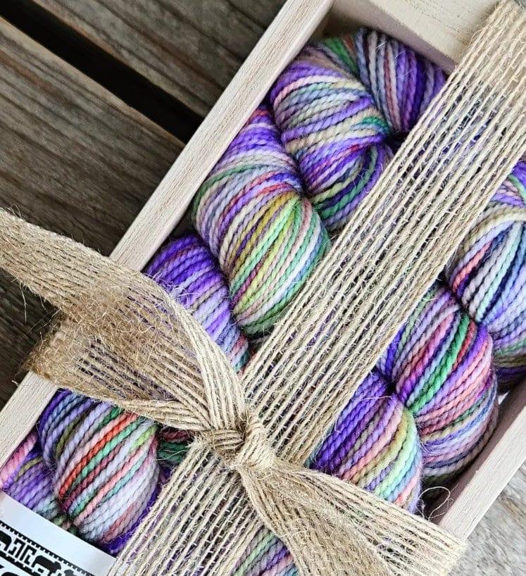 Sock knitting kit with yarn, pattern, and needles for making handmade socks