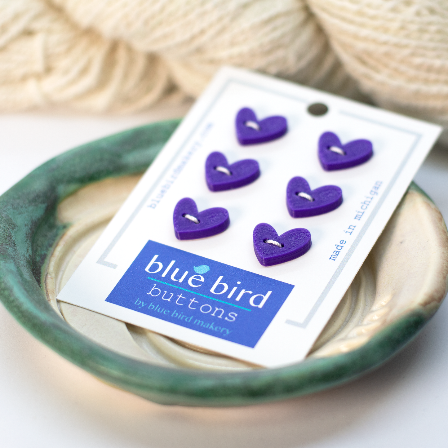 Set of 6 purple heart-shaped craft buttons on a card from Blue Bird Makery