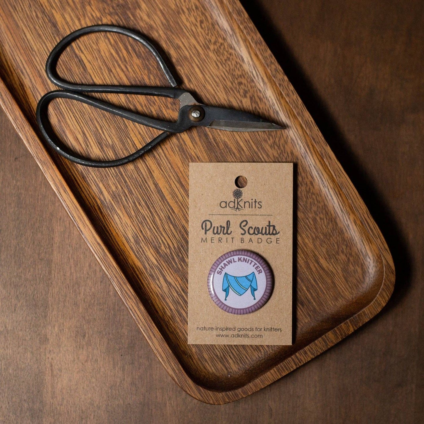 Camp Stitchwood Purl Scouts Merit Badge with Scissors on a Wooden Tray, merit badge required for eagle