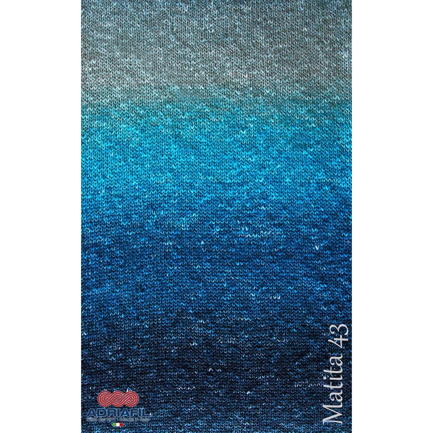 Adriafil Matita yarn in gradient shades of blue and gray, perfect for creative knitting projects