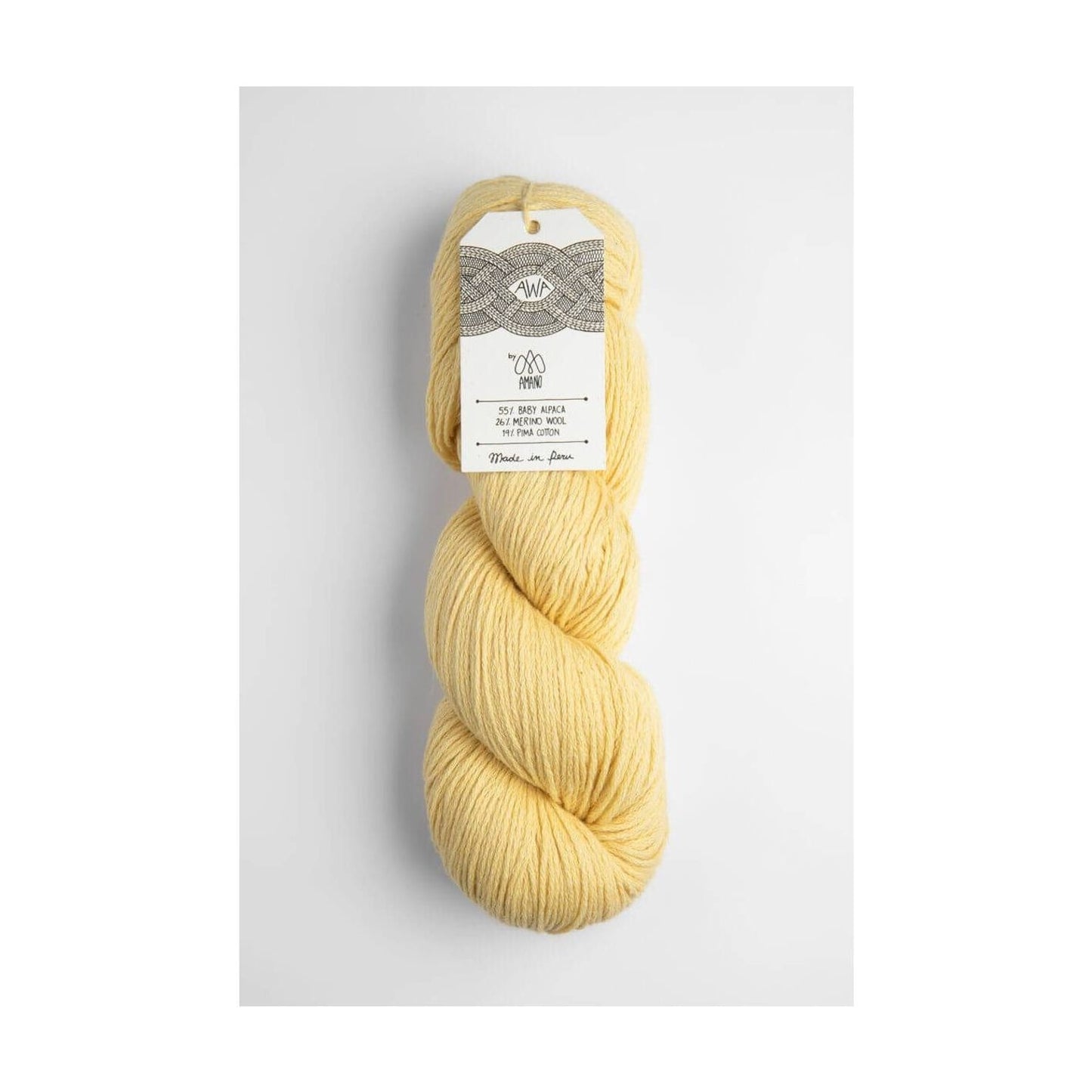 Amano yarn by Berroco in soft yellow, perfect for knitting and crochet projects.