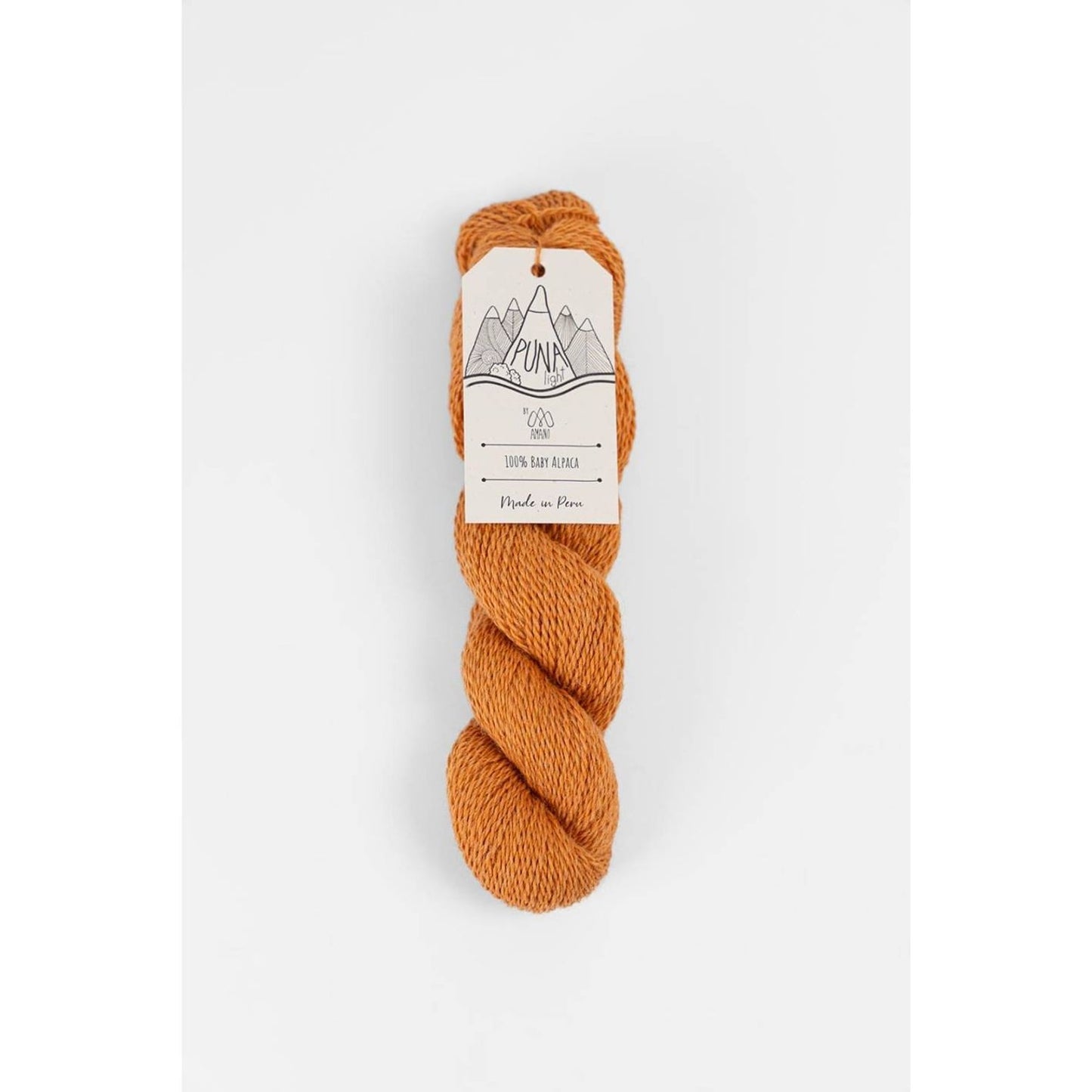 Berroco Amano Puna Light baby alpaca yarn in warm rust orange twisted skein with label
