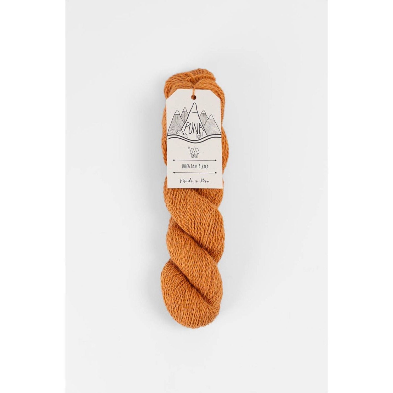 Berroco Amano Puna Light baby alpaca yarn in warm rust orange twisted skein with label
