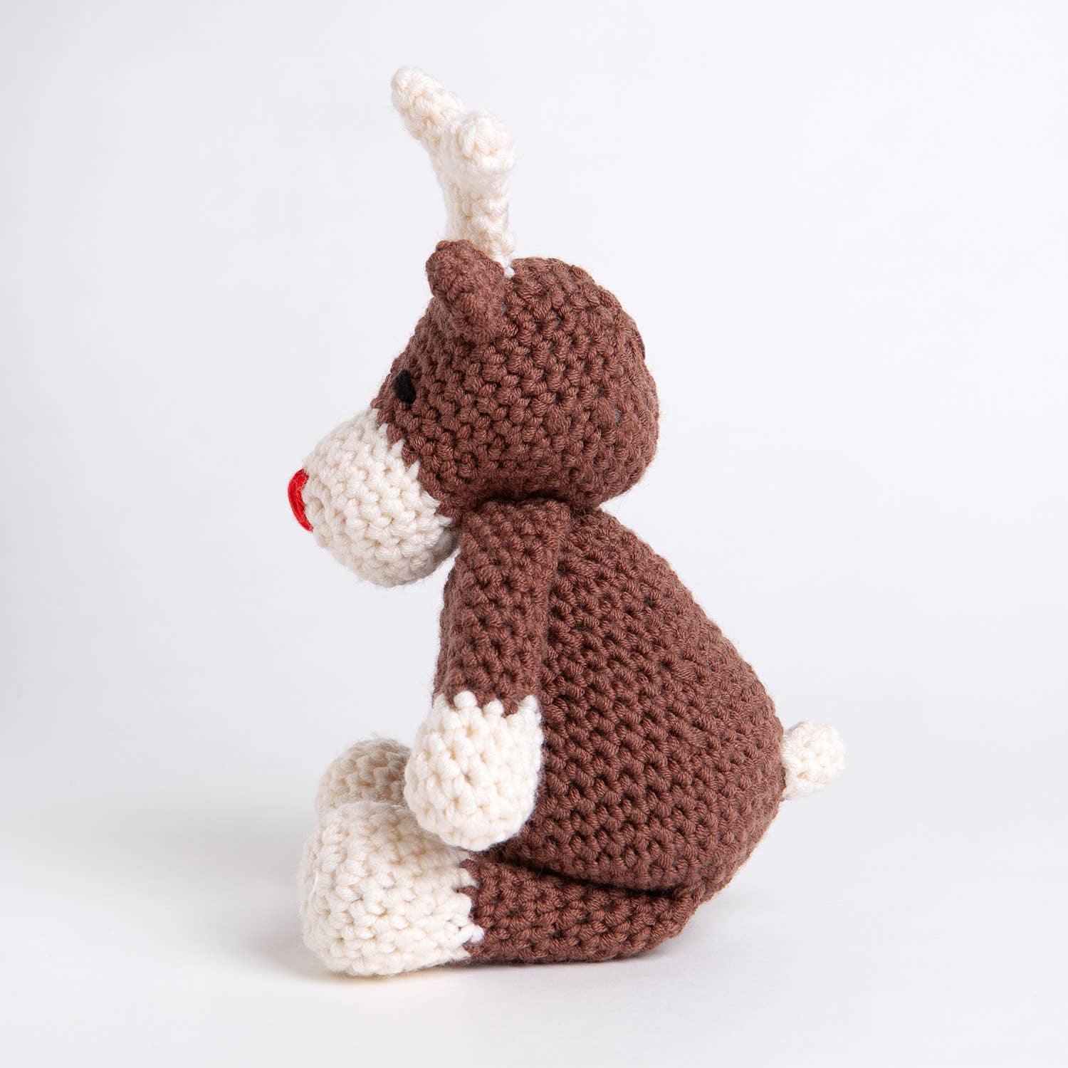 Belle the Reindeer crochet pattern brown and cream handmade amigurumi reindeer with red nose and antler