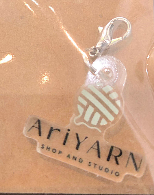 AriYARN Shop and Studio handmade yarn stitch marker with a yarn ball design and metal clasp