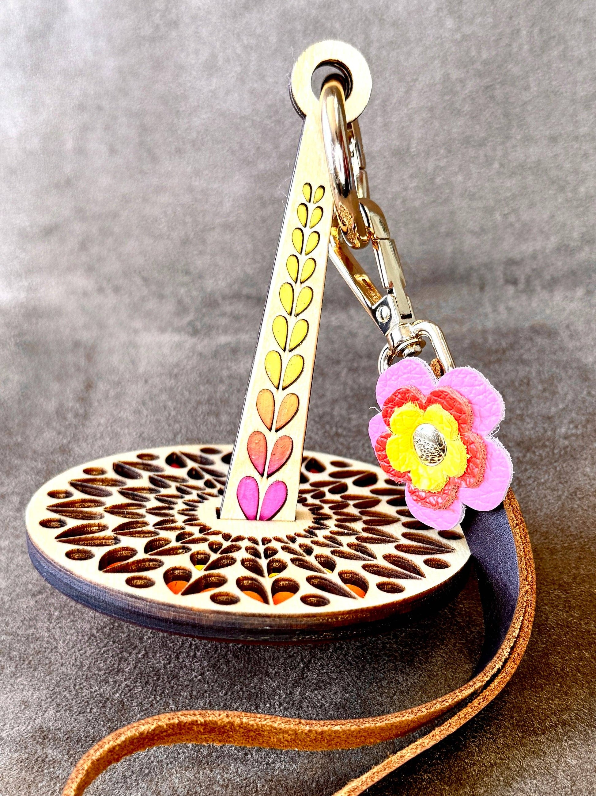 Lemonwood El Corazon wooden yarn accessory round laser cut guide with painted leaf arm leather strap and flower charm