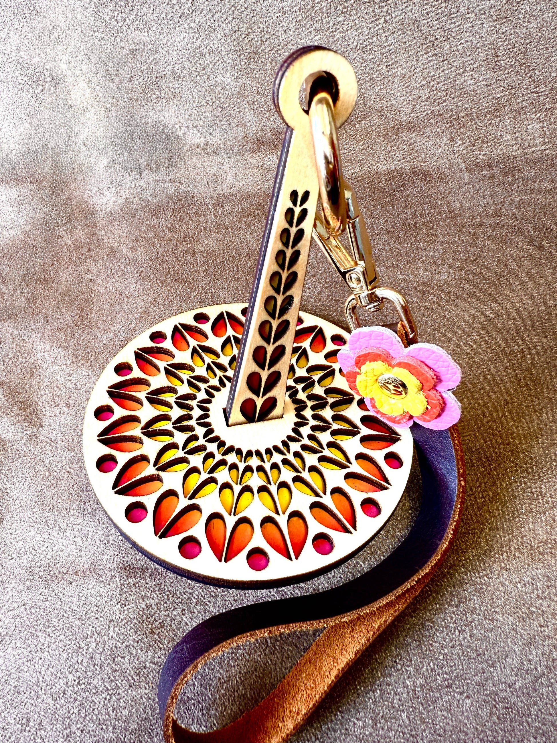 Lemonwood El Corazon wooden yarn accessory with laser cut mandala multicolor inset leather wrist strap and flower charm