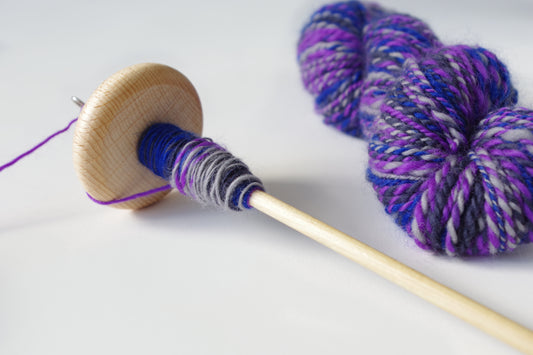 AriYARN Shop and Studio workshop drop spindle with purple and gray handspun skein yarn plying class near Chicago