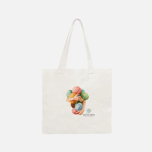 AriYARN Shop and Studio canvas tote with colorful yarn balls and logo yarn tote bag for knitters