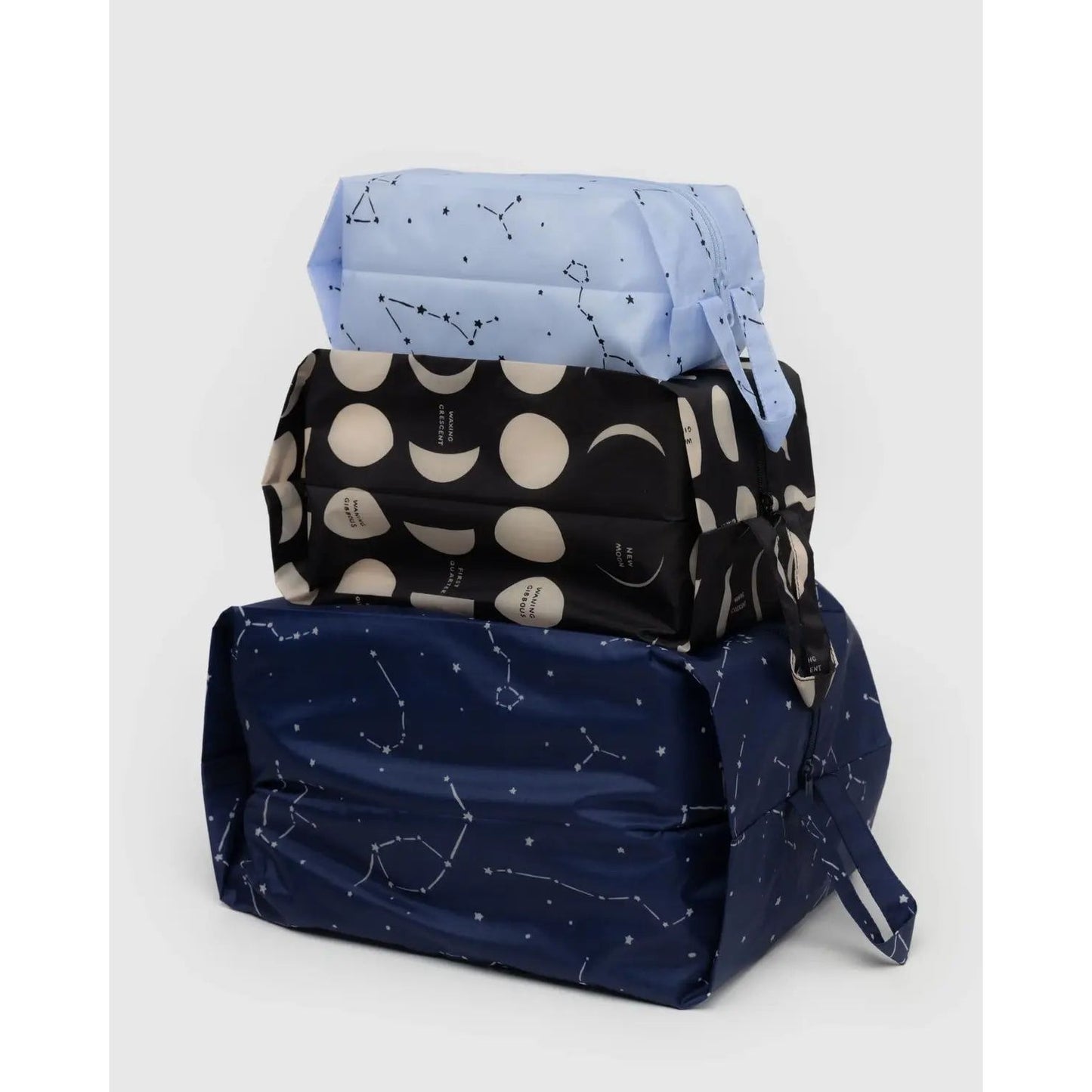Baggu 3D Zip Set in assorted celestial patterns, perfect for organizing and travel needs