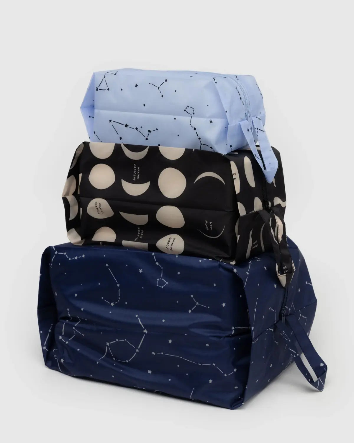 Baggu 3D Zip Set in assorted celestial patterns, perfect for organizing and travel needs