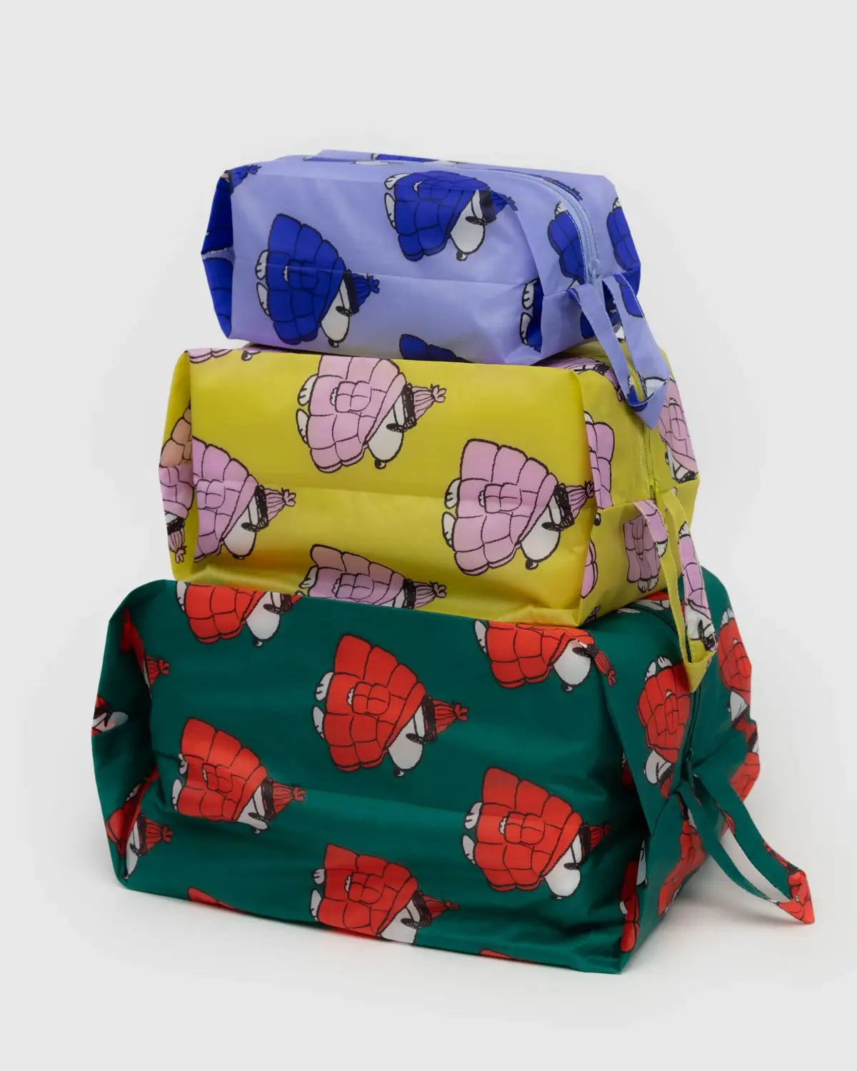 Baggu 3D Zip Set of Three Colorful Zip Bags in Purple, Yellow, and Green with Fun Turtle Print