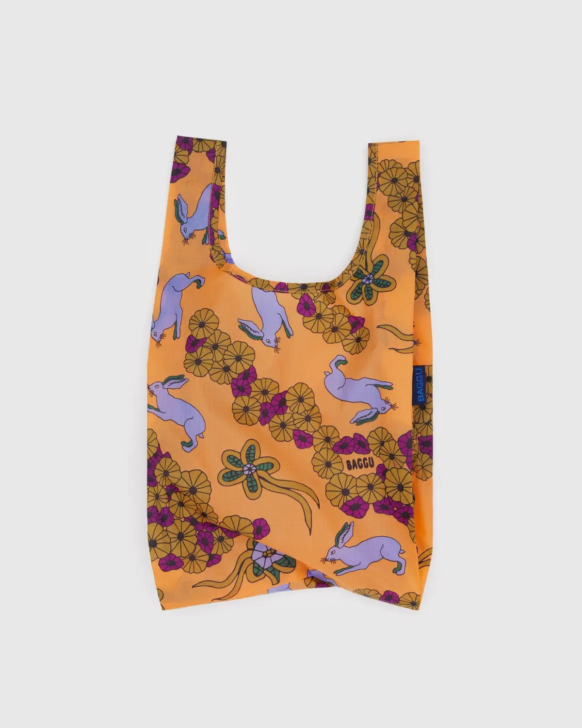 Baby Baggu reusable bag featuring a colorful rabbit and floral design for eco-friendly shopping