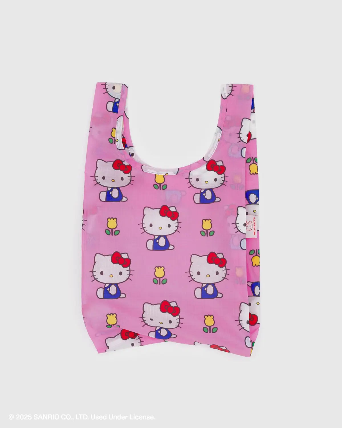 Baby Baggu reusable bag in pink with colorful Hello Kitty designs for shopping and daily use