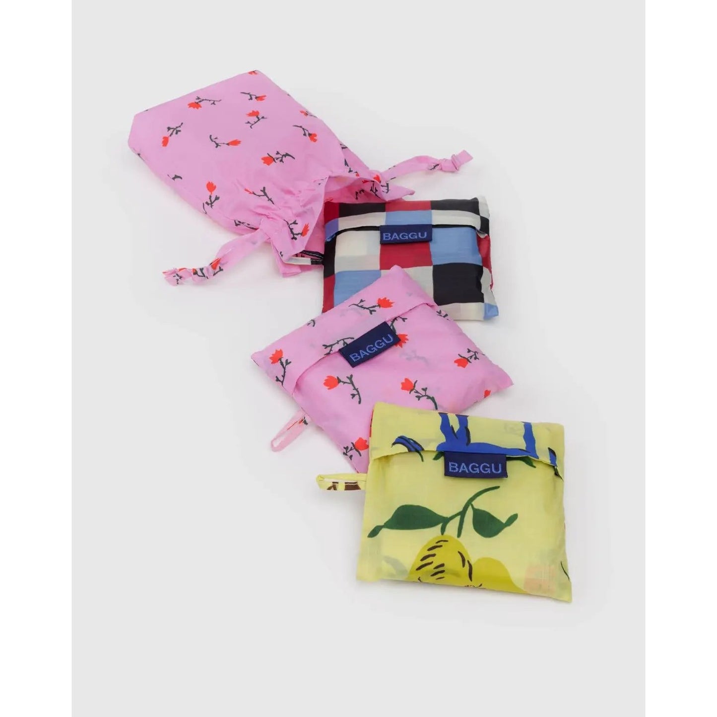 Baggu Standard Reusable Bag Set in assorted colors and patterns, includes a compact carrying pouch