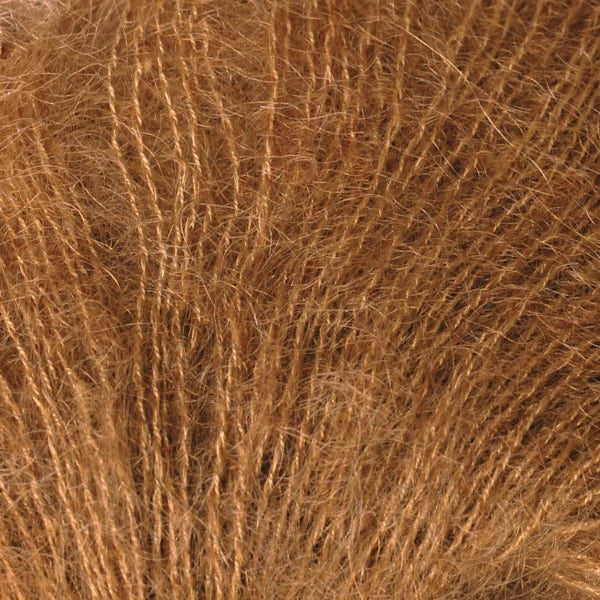 Soft and fluffy Berroco yarn in rich brown shade perfect for knitting and crafting projects