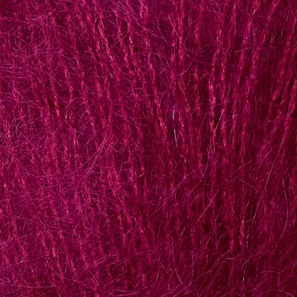 Berroco yarn in deep magenta shade, perfect for vibrant knitting and crochet projects