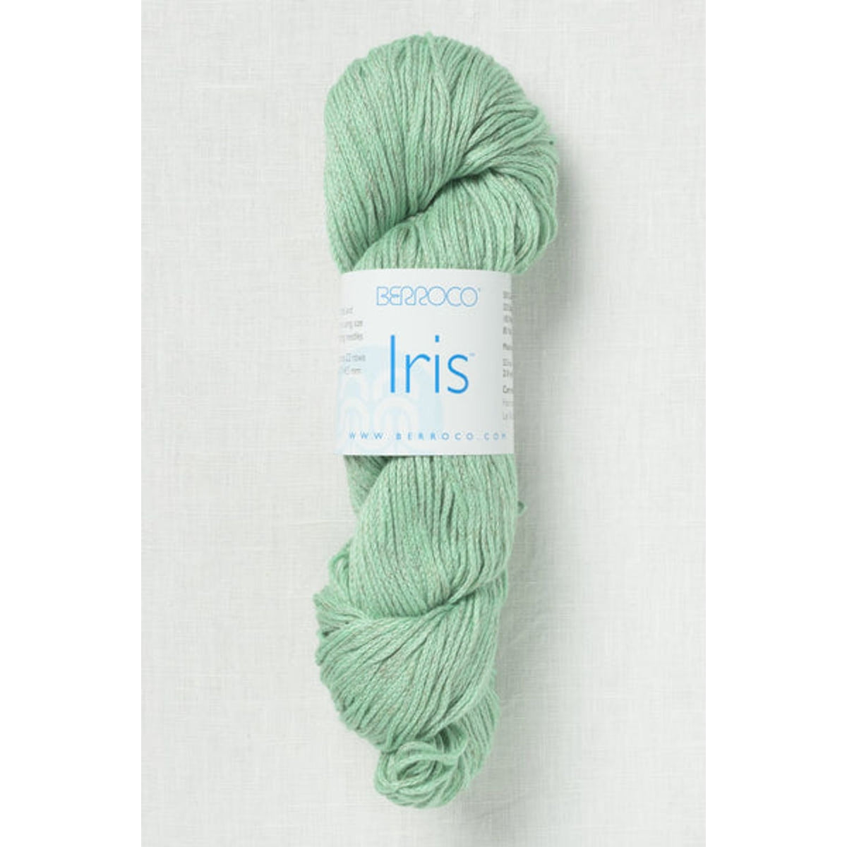 Berroco yarn in soft green shade labeled Iris, perfect for knitting and crochet projects