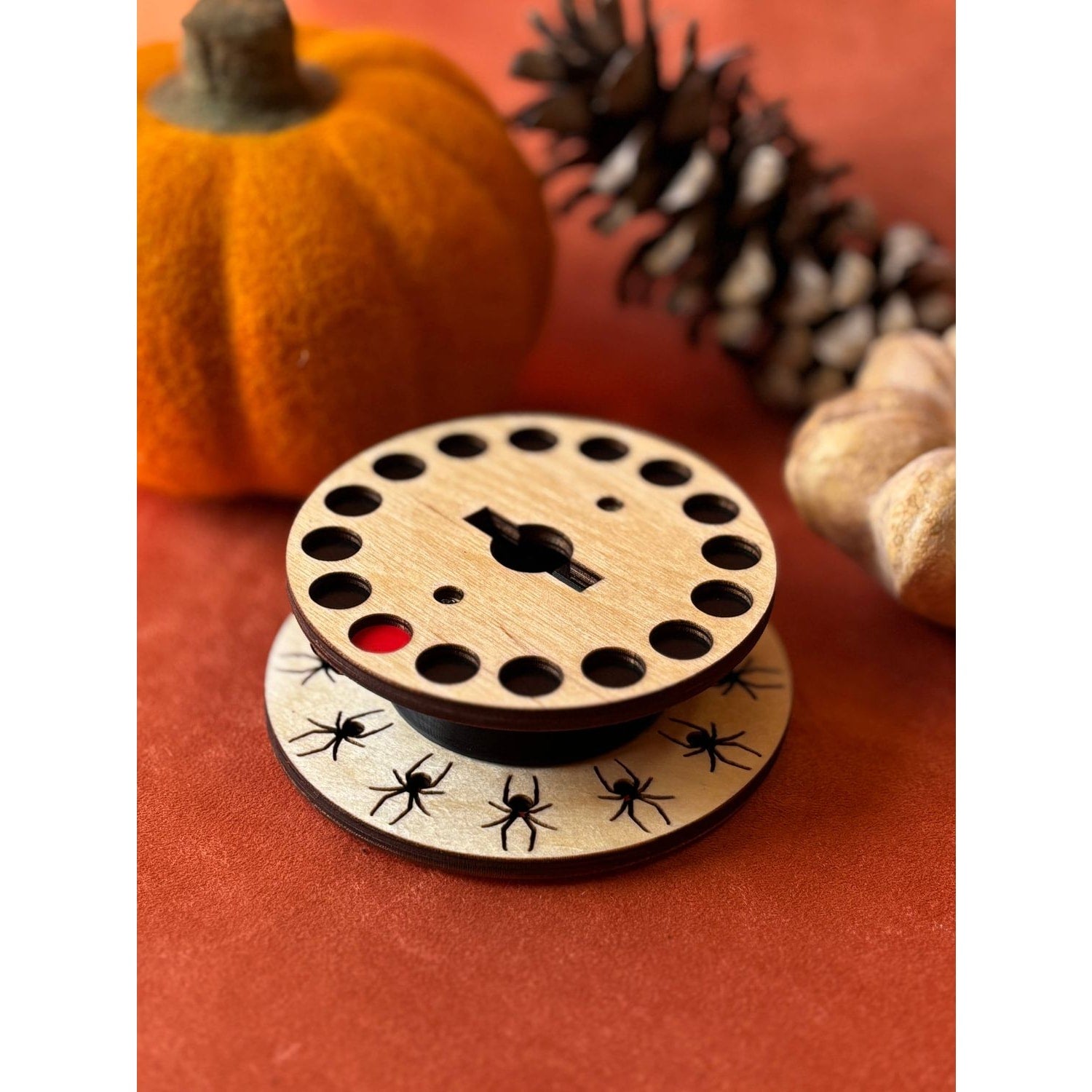 Lemonwood black widow game spinner with wooden base, designed for family fun and entertainment