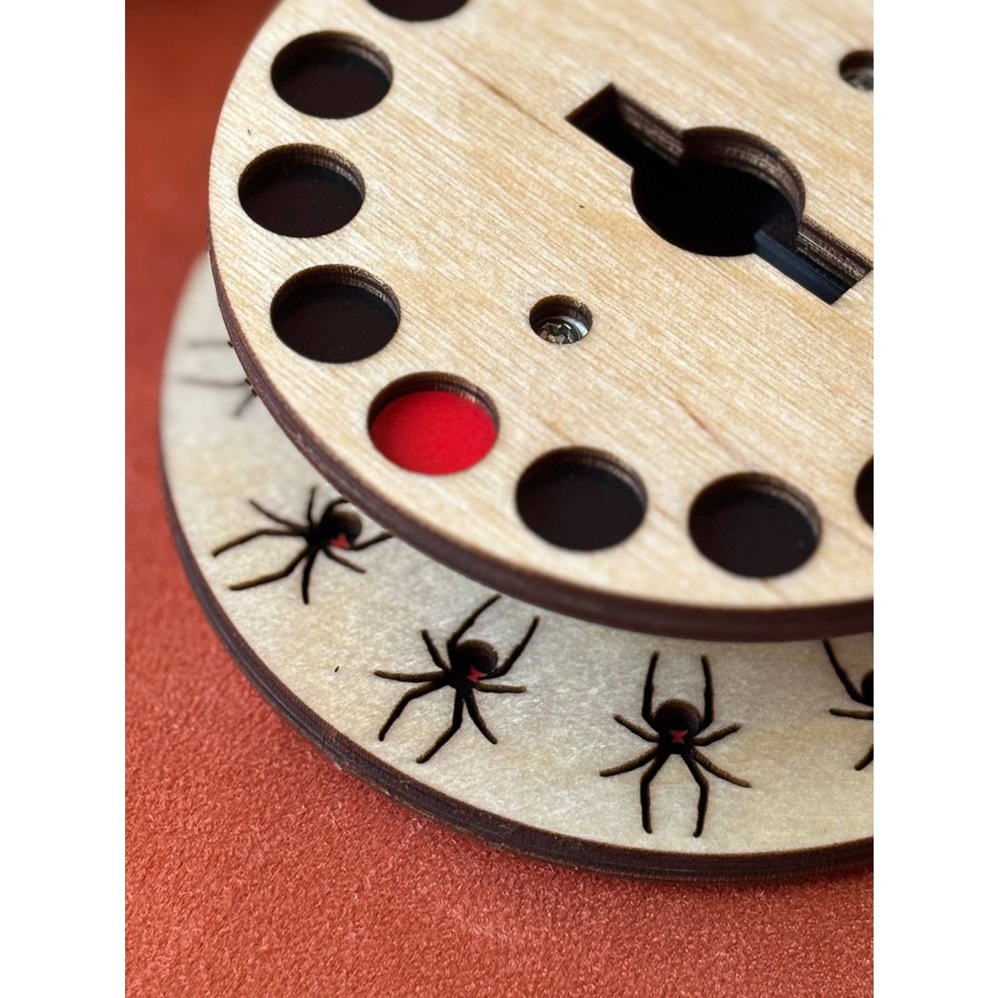 Lemonwood black widow themed wooden craft kit with detailed spider cutouts and circular design