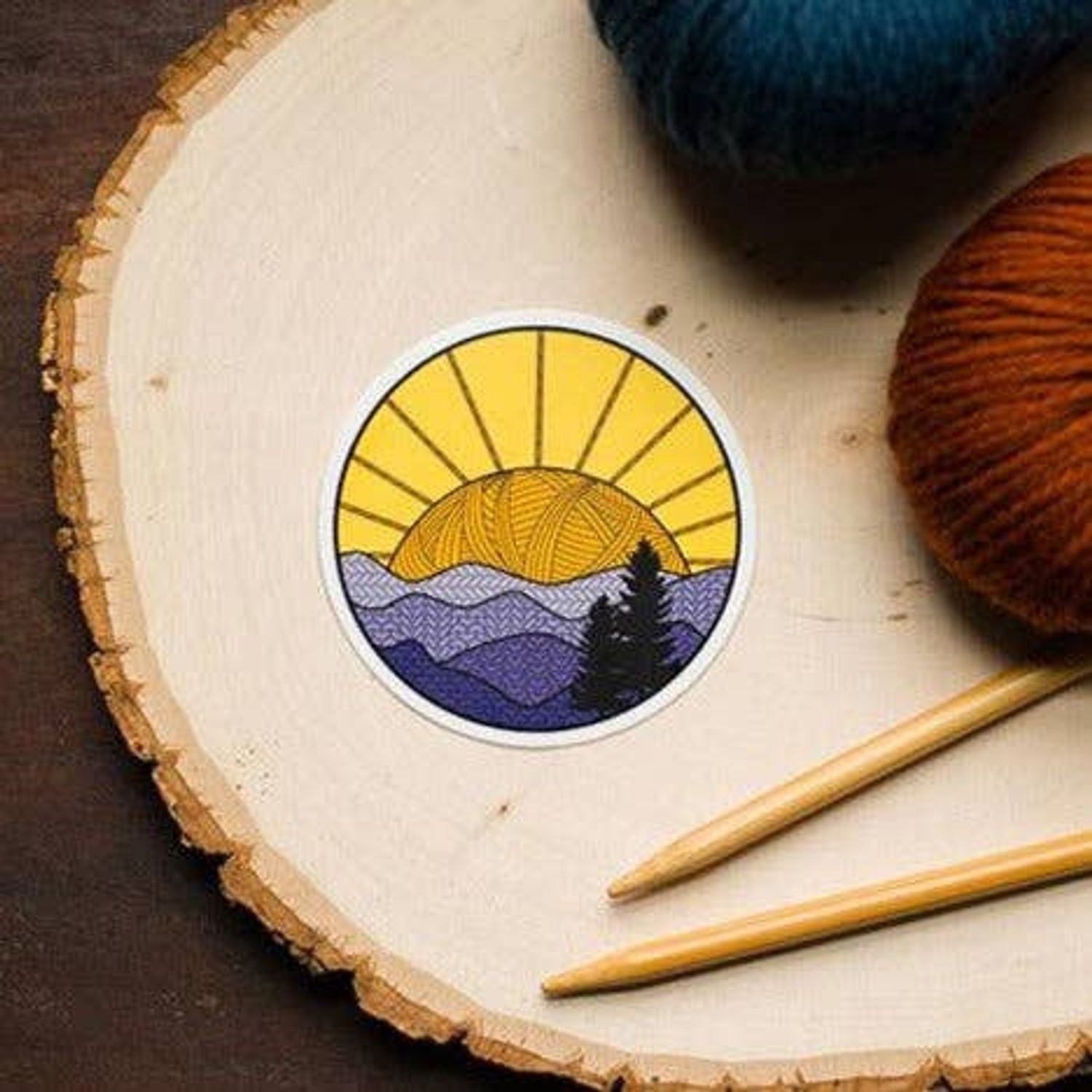 Colorful Camp Sticker featuring a sunrise over mountains and trees, perfect for outdoor enthusiasts