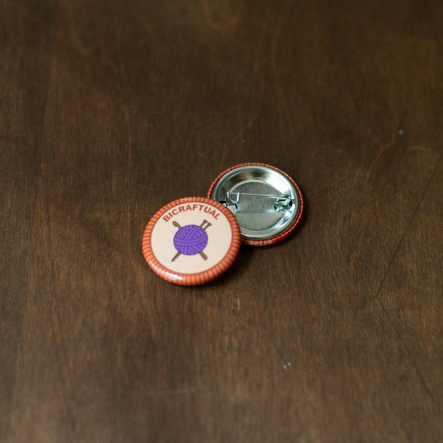 Camp Stitchwood Craft Badge Pin featuring yarn symbol, a merit badge required for eagle scouts