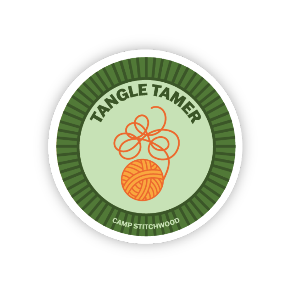 Camp Stitchwood Tangle Tamer name badge sticker featuring a yarn ball design